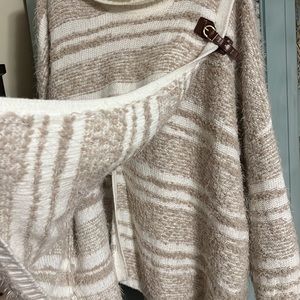 Calvin Klein sweater with attachment on the shoulder.
